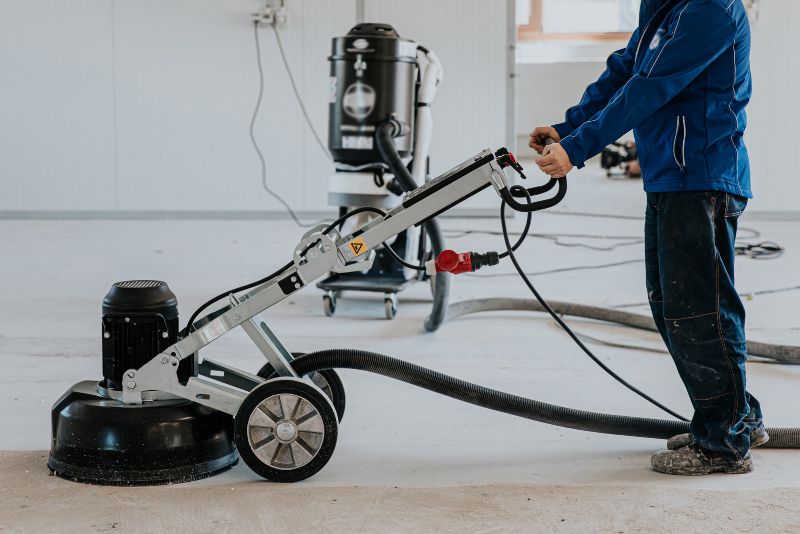 finishing concrete floor with a concrete polisher