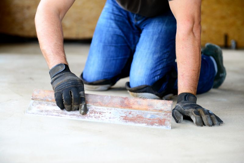 man polishing concrete floor