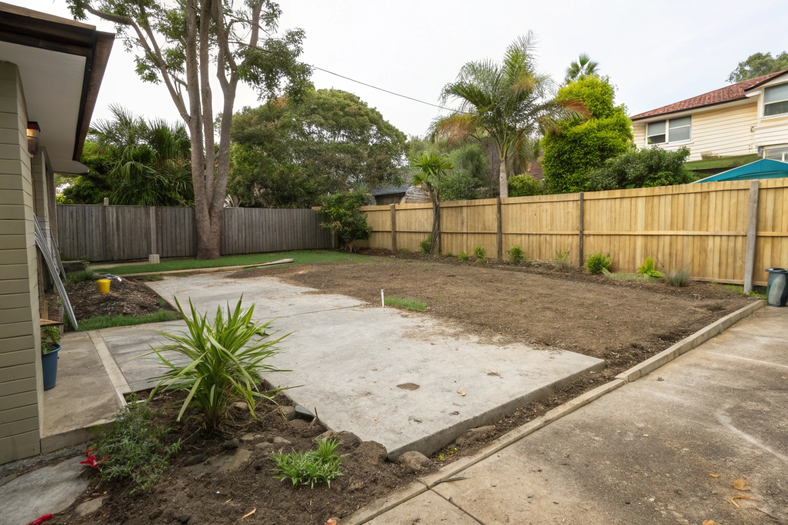 Cleared residential site in Coffs Harbour after concrete slab removal, ready for new concrete installation